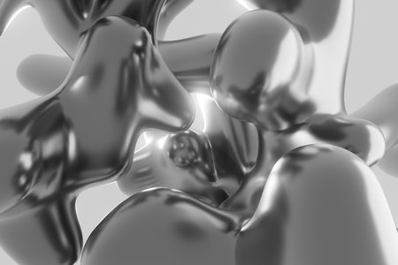 A silver blob of metal with a shiny surfaceの写真素材