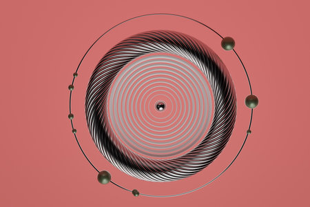 A close up of a red circle with a black and white swirl around itの写真素材