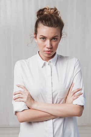 Portrait of young beautiful woman in studio