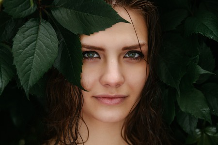 Natural female beauty in summer rain outdoorsの写真素材