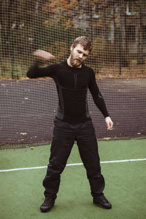 Mature Male Athlete Stretching outdoor doing sportの写真素材
