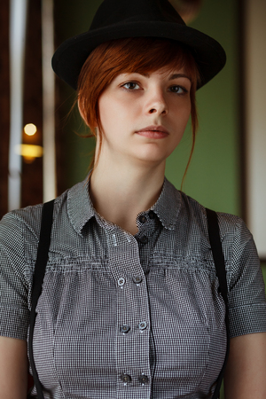 Portrait close up of young beautiful woman indoorの写真素材