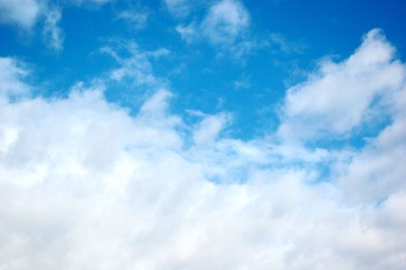 Random white and gray clouds formation and blue skyの写真素材