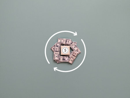 square magnet with currency symbol, banknotes and circular arrow. concept of cash flow or cash backの写真素材