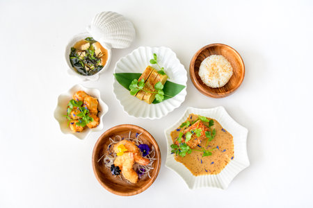 Set of Japanese dishes: miso soup, tamago, tempura shrimp, riceの写真素材