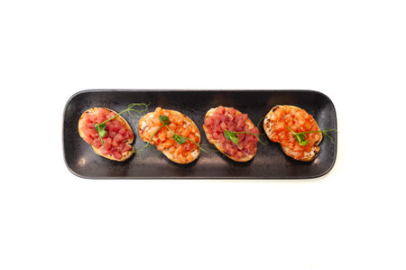Bruschetta with salmon and tuna tartare on ciabatta toast. High quality photoの写真素材