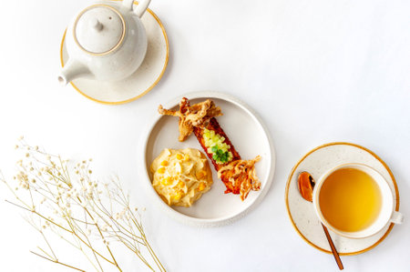Light breakfast in a restaurant with green tea and pumpkin pureeの写真素材