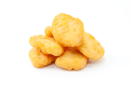 Golden Fried Chicken Nuggets on Whiteの写真素材