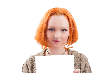 Beautiful yong woman with red hair isolated on whiteの写真素材