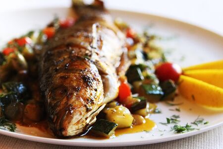 Fish with vegetables and spices
