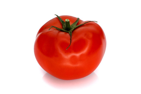 Juicy tomatoes on the isolated backgroundの写真素材