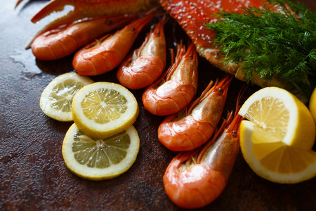 Beautiful shrimp with crab meat lemon and greensの写真素材