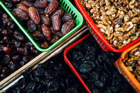Prunes, dates and walnuts close-up