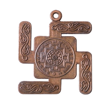 Copper medallion buddhist on white backgroundの写真素材
