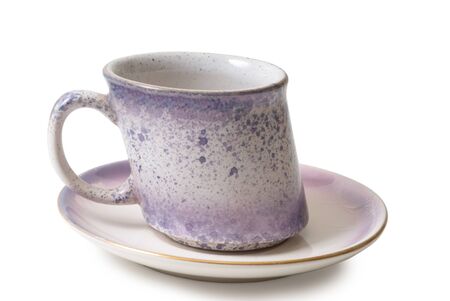 Coffee mug of unusual design on a white background の写真素材