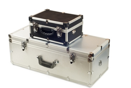 Two suitcases, aluminium and plastic on a white backgroundの写真素材