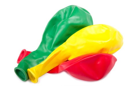 Three  deflated balloon isolated on white 