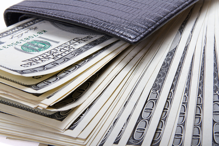 Money in black leather wallet, closeupの写真素材