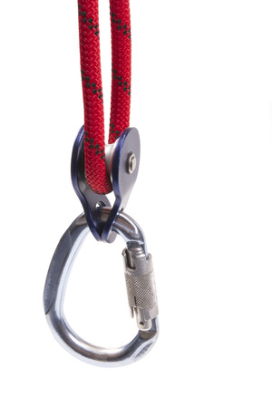 Climbing equipment - pulley, rope, carabiner on a white backgroundの写真素材