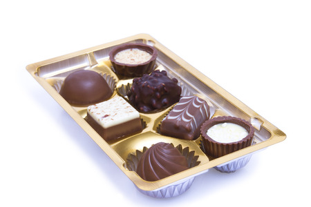 Chocolate sweets in box close upの写真素材