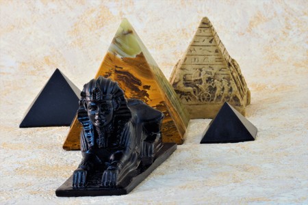 Sphinx in the background of pyramidsの写真素材