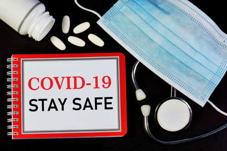 COVID-19 coronavirus infection, stay safe-label on medical form. It is diagnosed by a doctor, based...