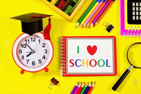 I love school-text inscription in colored letters of the alphabet in a student's notebook on the background of stationery. Opportunity to get new knowledge and education.の写真素材