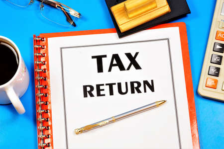 Tax return - text inscription on the form of the document. Official statement of the taxpayer on the received income.の写真素材