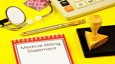 Medical account statement-text inscription on the form on the folder. Statement of a financial institution, against the background of medical accessories, stethoscope, medication. Calculator for calculations.の写真素材