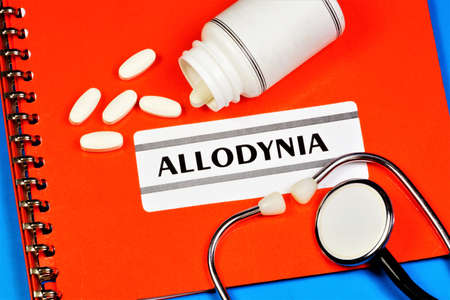 Allodynia - text inscription on a form in a medical folder. Diagnosis by a doctor, treatment with medications.の写真素材
