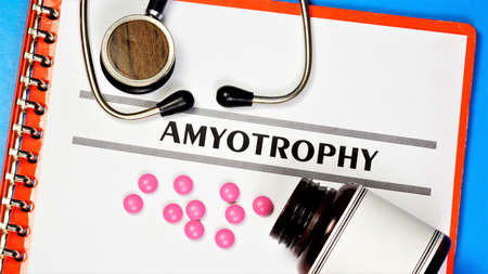 Amyotrophy - the text label on the form in the medical folder. Diagnosis by a doctor. Prevention and treatment with medications.の写真素材