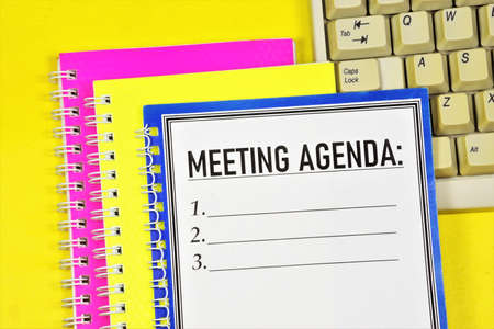 Meeting agenda - a text label in the planning Notepad. List of current issues discussed at the meeting or conference.の写真素材
