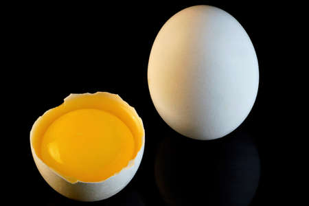 Egg is a food product, has an oval shape, consists of protein and yolk. Widely used in cooking chicken eggs.の写真素材