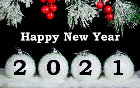 Happy New year to 2021. Text message of congratulations. Festive background - elegant snow-covered...