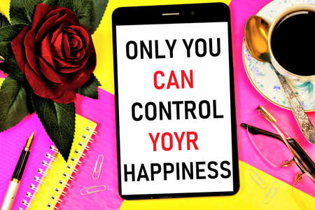 Only You can control your happiness. Text caption for inspiration on the smartphone screen....