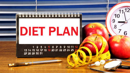 Diet plan - the inscription of text on the planning calendar. A healthy way of life, rules of eating, the main goal is weight loss.の写真素材