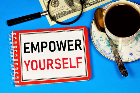Empower yourself. Text inscription in a Notepad For planning a program of personal growth and...