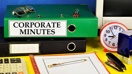 Corporate protocols. Text label on the folder office of the Registrar. Documents that record the event, fact, and agreement. Increases the effectiveness of the company's activities.の写真素材
