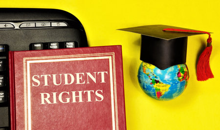 Student rights. Text inscription on the book. Literacy will help you avoid trouble. It is important to use them in difficult situations.の写真素材