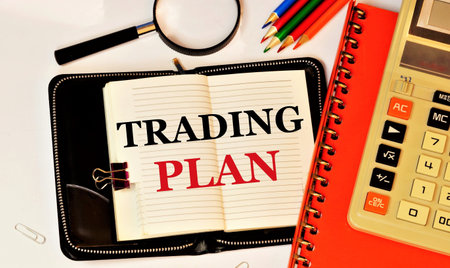 Trading plan. Text label in the planning notebook. Development of a method for achieving the goal of sustainable competitive advantage of the business.の写真素材