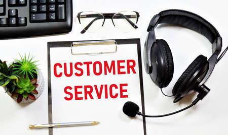 Customer service. Text label in the contact pad of the call center. Survey and examination of the quality of services.の写真素材