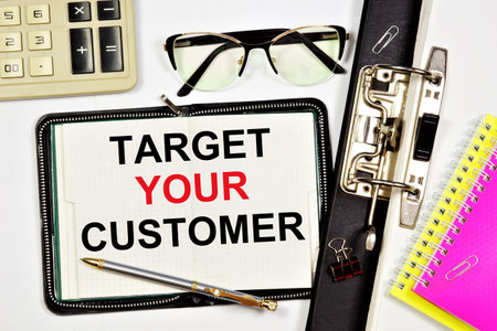 Target your customer. A text label in the working notepad. Planning the business strategies and prospects for the future.の写真素材