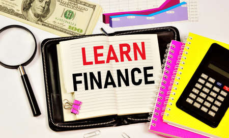 Learn finance. A text label in the planning notebook. Knowledge of economic relations in the distribution and use of monetary funds.の写真素材