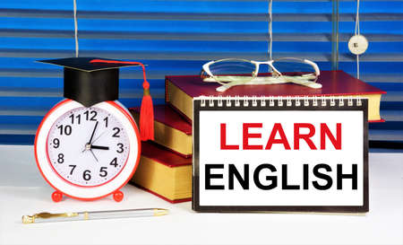 Learn English. The inscription of the text on the notepad. The study of the sign system of speech information in the language form.の写真素材