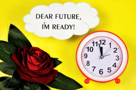 Dear future, I am ready-an inscription on the background of a rose flower and a clock symbol of...