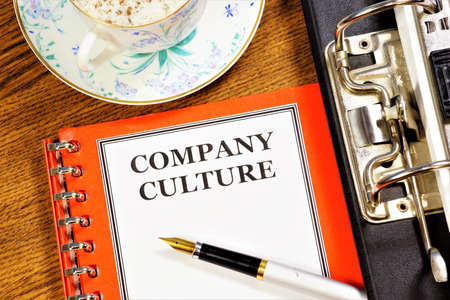 Company culture. business ethics-a text label on the planning folder. Solving problems in the business environment of business, moral corporate principles.の写真素材