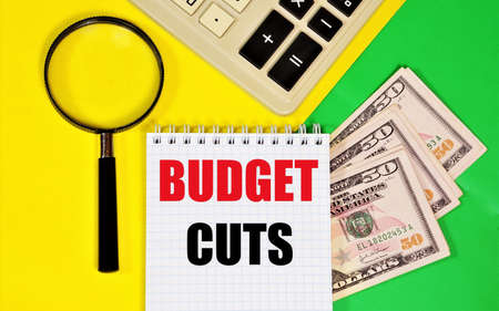 Budget cuts. A text label in the planning notebook. Optimization of financial expenses in business.の写真素材