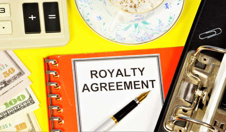 Royalty agreement. Text label on the planning folder. License fee, monetary compensation, for the use of the property.の写真素材
