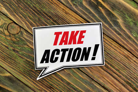 Take action! The inscription of the text in the plate. Drawing up the tasks of the concept of events, achieving success in the future.の写真素材