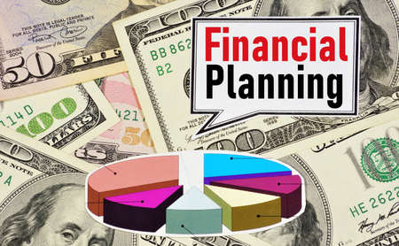 Financial planning. Text inscription on the background of cash. Ensuring the well-being of doing business. Effective asset management, avoid costs.の写真素材